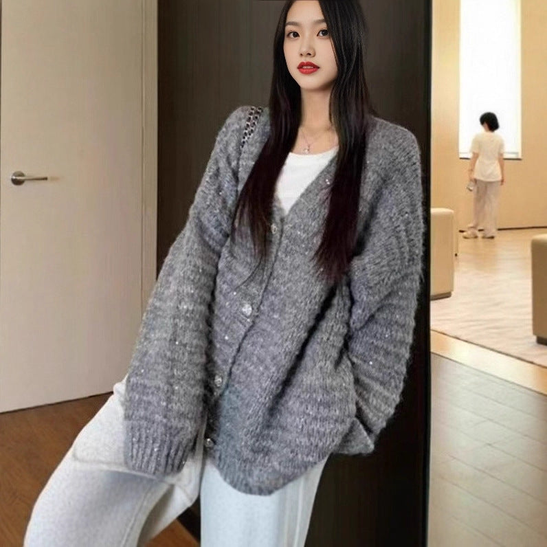 Damen Strickjacke mit voluminösen Ärmeln und einzigartiger Maschenstruktur Mirla-Eva Jonsson