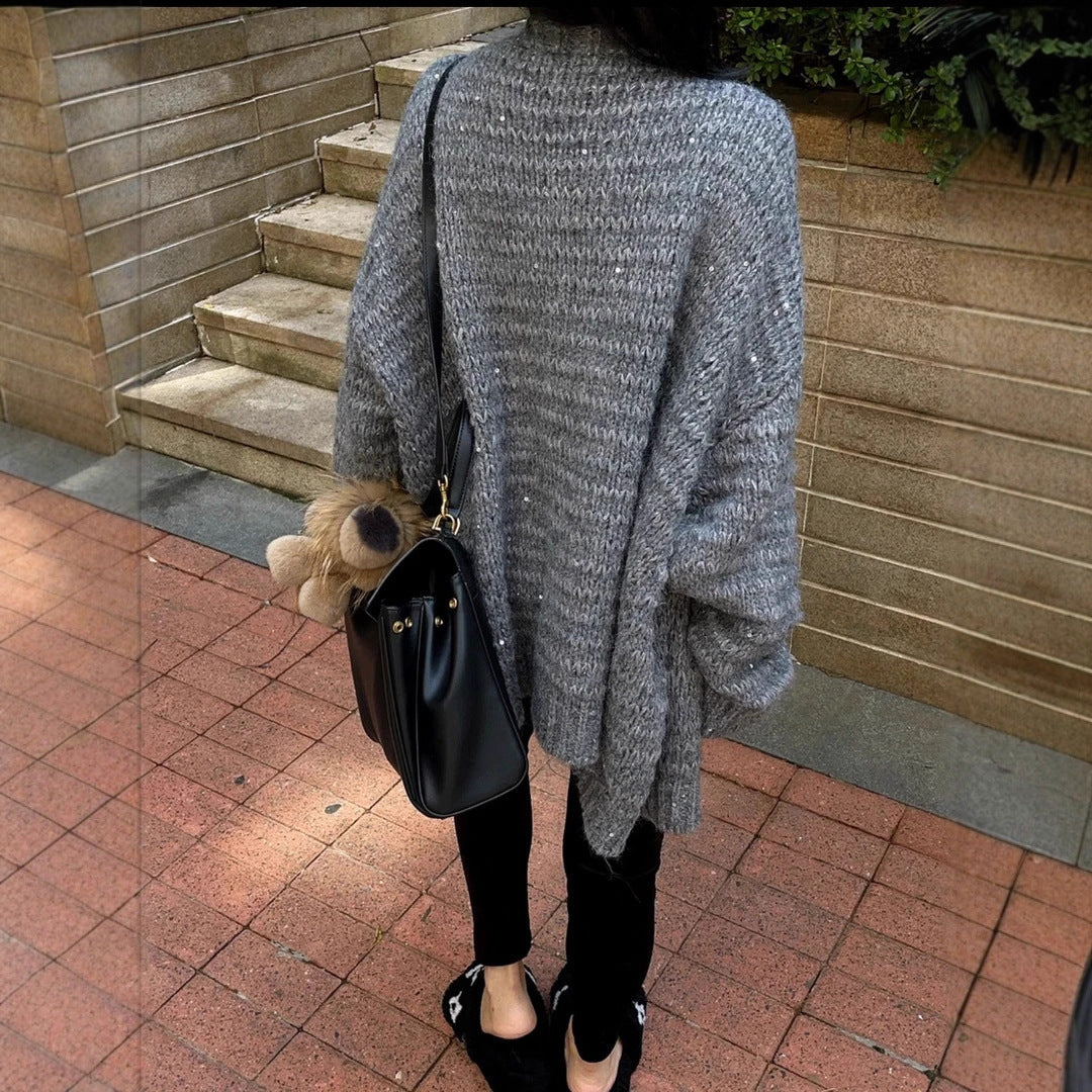 Damen Strickjacke mit voluminösen Ärmeln und einzigartiger Maschenstruktur Mirla-Eva Jonsson