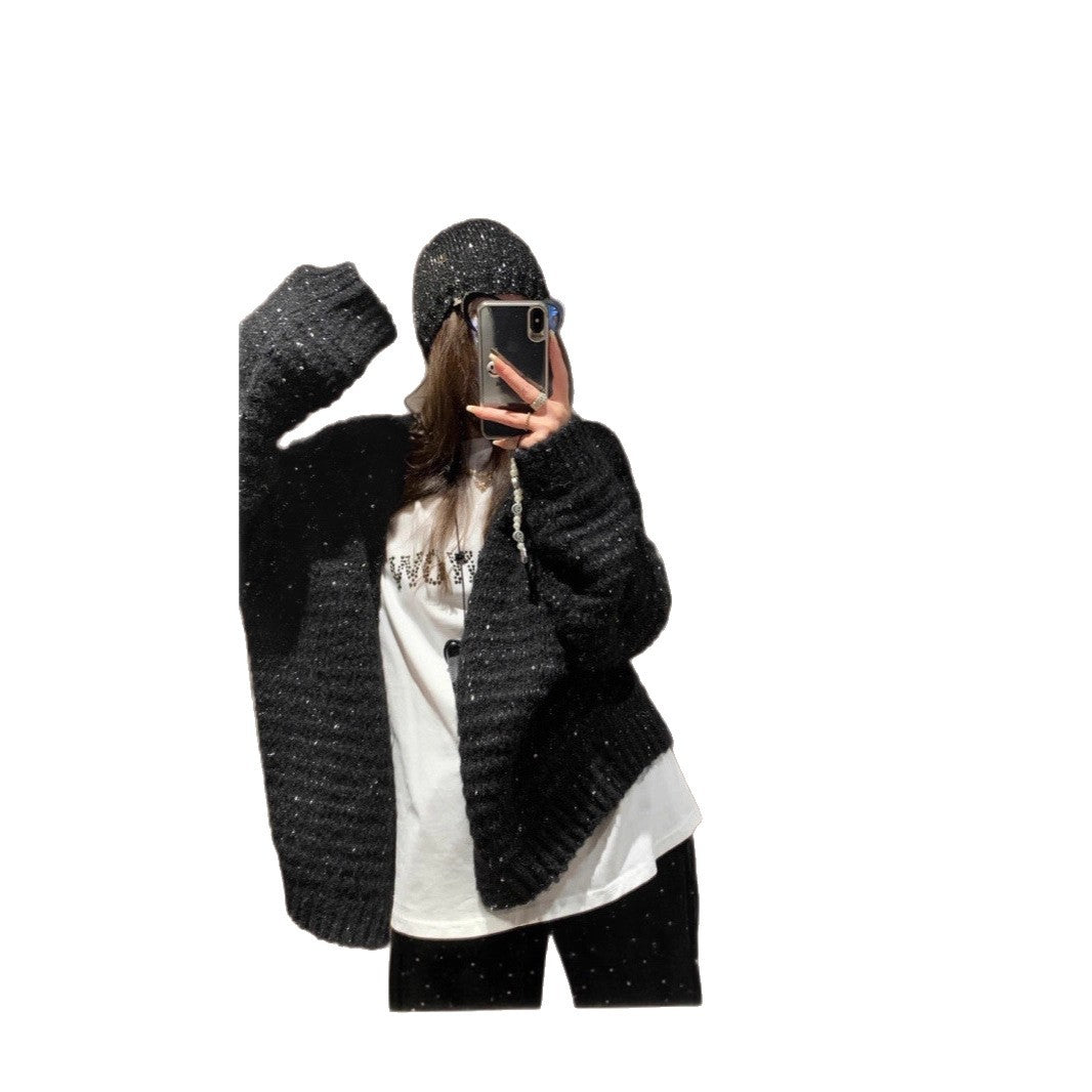 Damen Strickjacke mit voluminösen Ärmeln und einzigartiger Maschenstruktur Mirla-Eva Jonsson