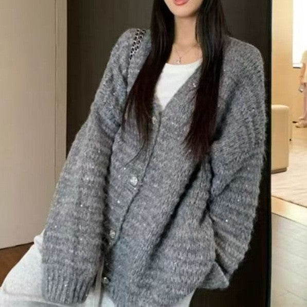 Damen Strickjacke mit voluminösen Ärmeln und einzigartiger Maschenstruktur Mirla-Eva Jonsson