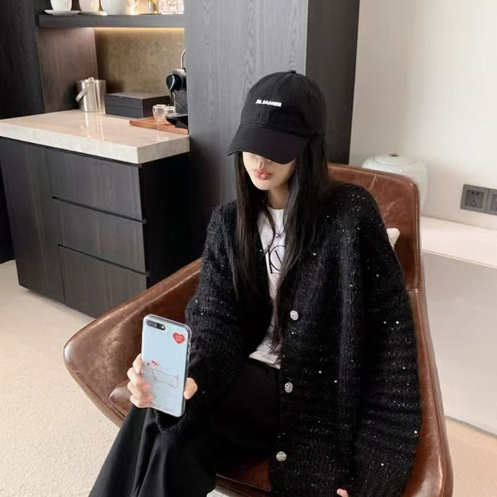 Damen Strickjacke mit voluminösen Ärmeln und einzigartiger Maschenstruktur Mirla-Eva Jonsson