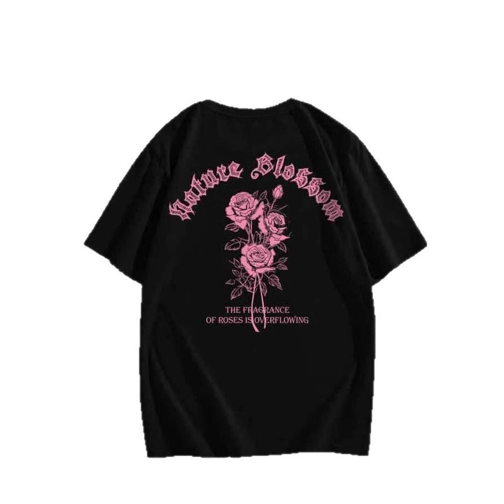Damen T-shirt med blommotiv och kreativ text Mirla-Eva Jonsson