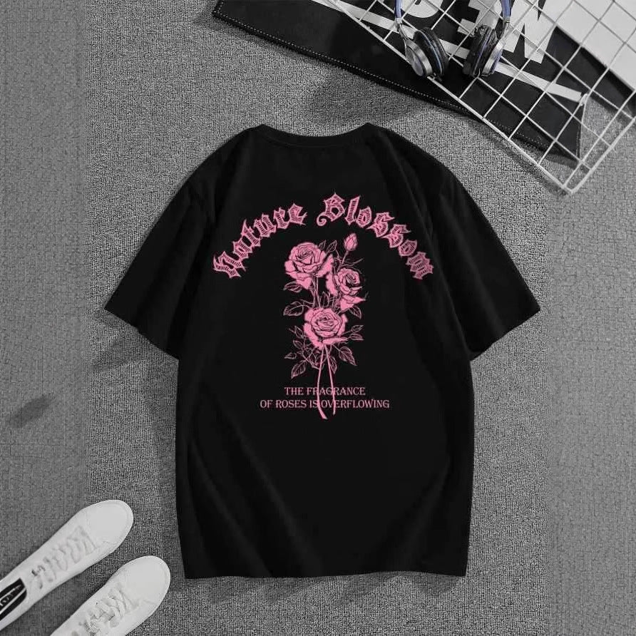Damen T-shirt med blommotiv och kreativ text Mirla-Eva Jonsson