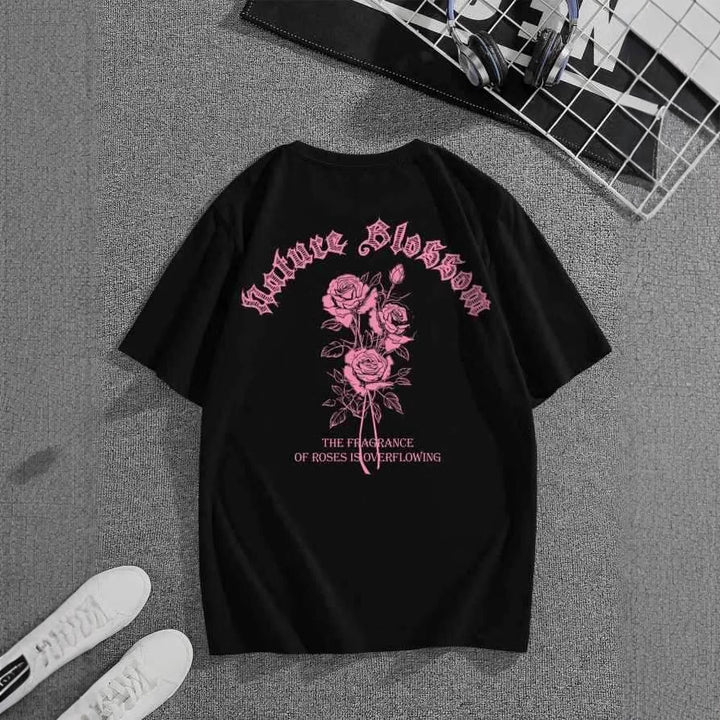 Damen T-shirt med blommotiv och kreativ text Mirla-Eva Jonsson