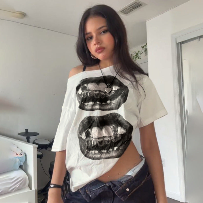 Damen T-shirt med glittrande korsdesign och avslappnad passform Mirla-Eva Jonsson