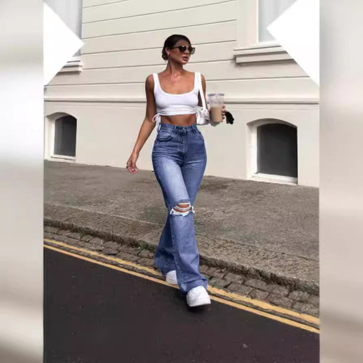 Damen Vintage Schlagjeans med moderiktiga slitdetaljer och hög midja Mirla-Eva Jonsson