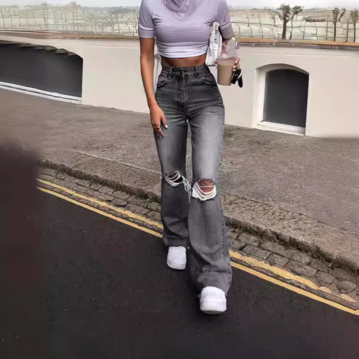Damen Vintage Schlagjeans med moderiktiga slitdetaljer och hög midja Mirla-Eva Jonsson