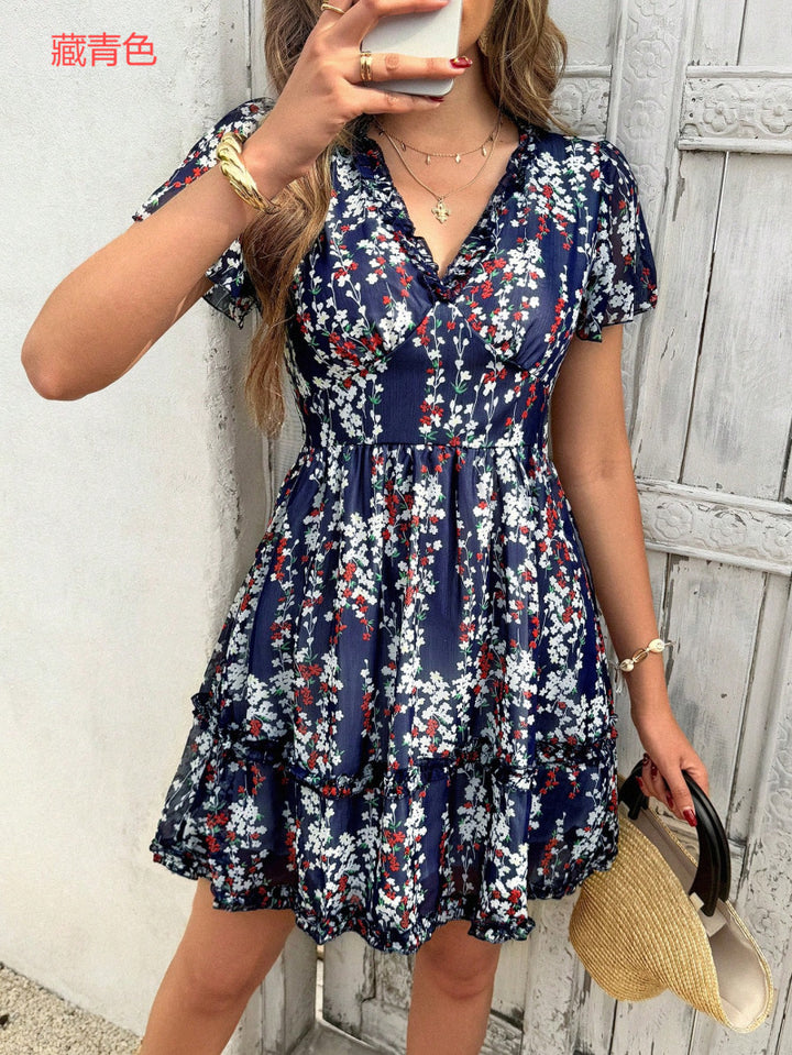 Damen Wickelkleid mit floralen Details und luftigen Ärmeln Mirla-Eva Jonsson