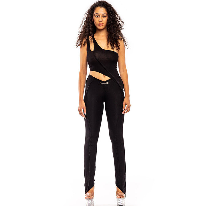 Damen asymmetrisk jumpsuit med modernt cut-out och elegant midjesnitt Mirla-Eva Jonsson