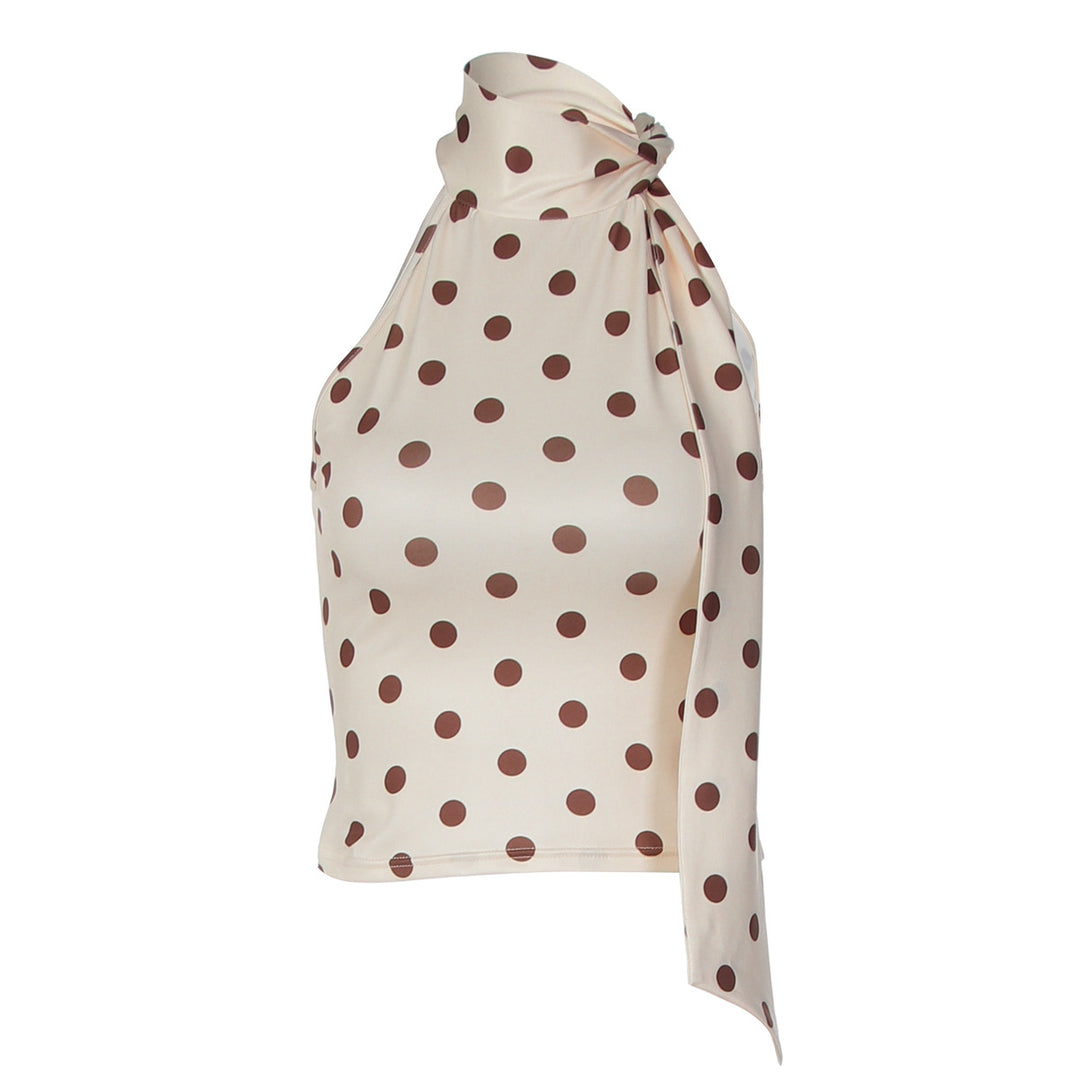 Damen asymmetrisk polka prick topp med höga skärlinjer och elegant halterdesign Mirla-Eva Jonsson