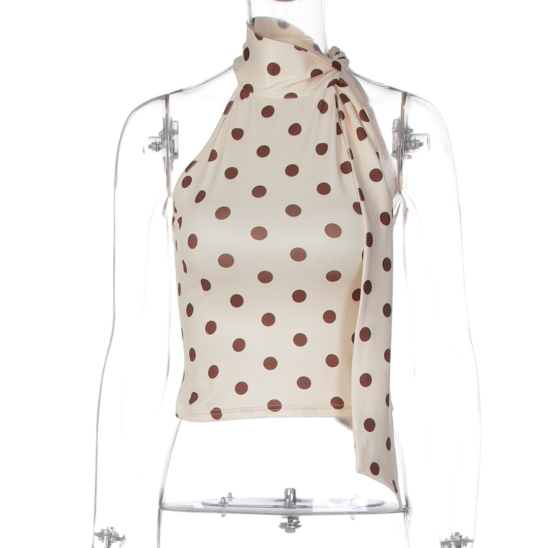 Damen asymmetrisk polka prick topp med höga skärlinjer och elegant halterdesign Mirla-Eva Jonsson