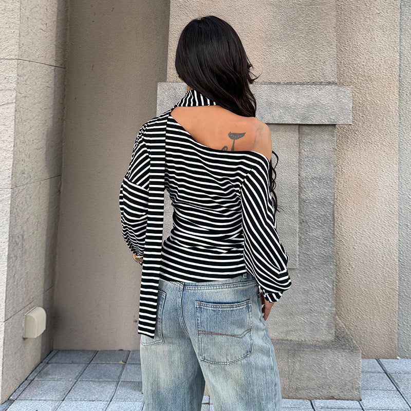 Damen asymmetrisk randigt topp med off-shoulder design och elegant knut Mirla-Eva Jonsson
