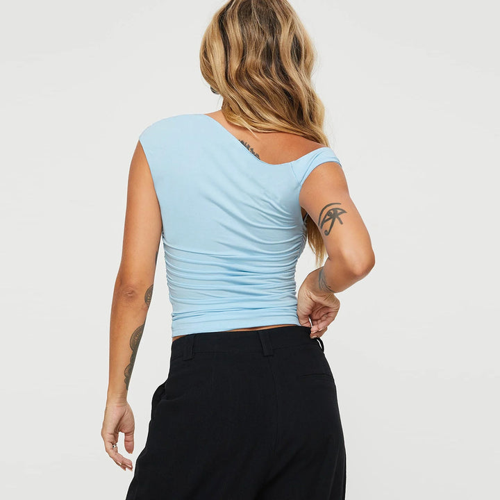 Damen asymmetriskt överdel med snyggt omslagsdesign Mirla-Eva Jonsson