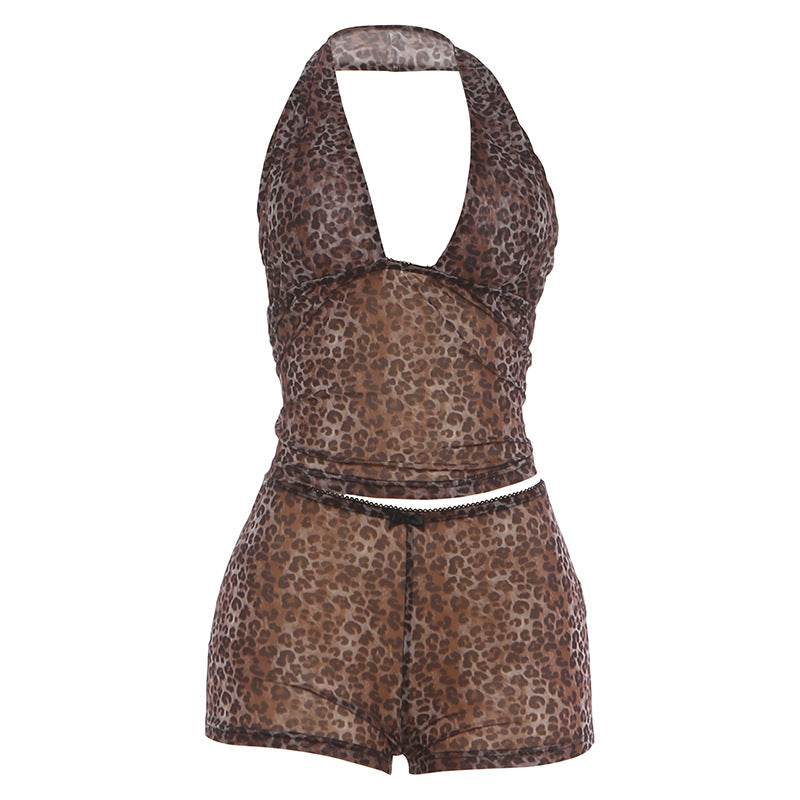 Damen avslappnad jumpsuit med leopardmönster och dekorativa detaljer Mirla-Eva Jonsson