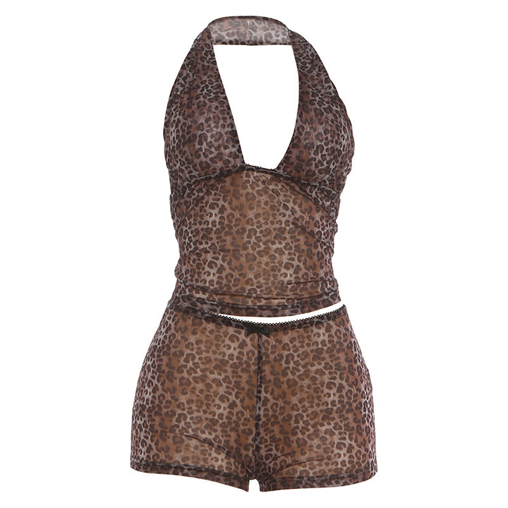 Damen avslappnad jumpsuit med leopardmönster och dekorativa detaljer Mirla-Eva Jonsson