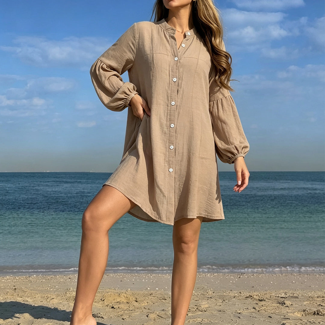 Damen avslappnad strandklänning med knappslå och ballongärmar Mirla-Eva Jonsson