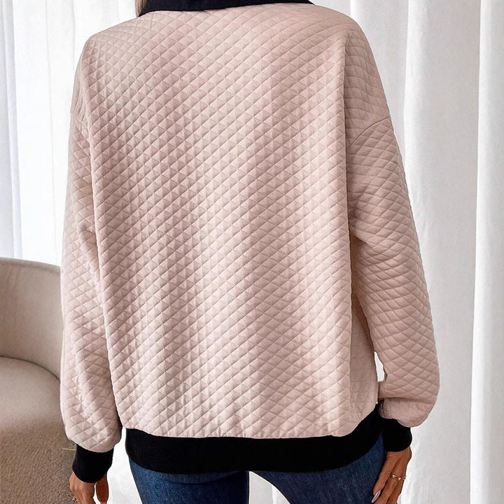 Damen avslappnad sweatshirt med klassisk polo-krage och knappdetaljer Mirla-Eva Jonsson