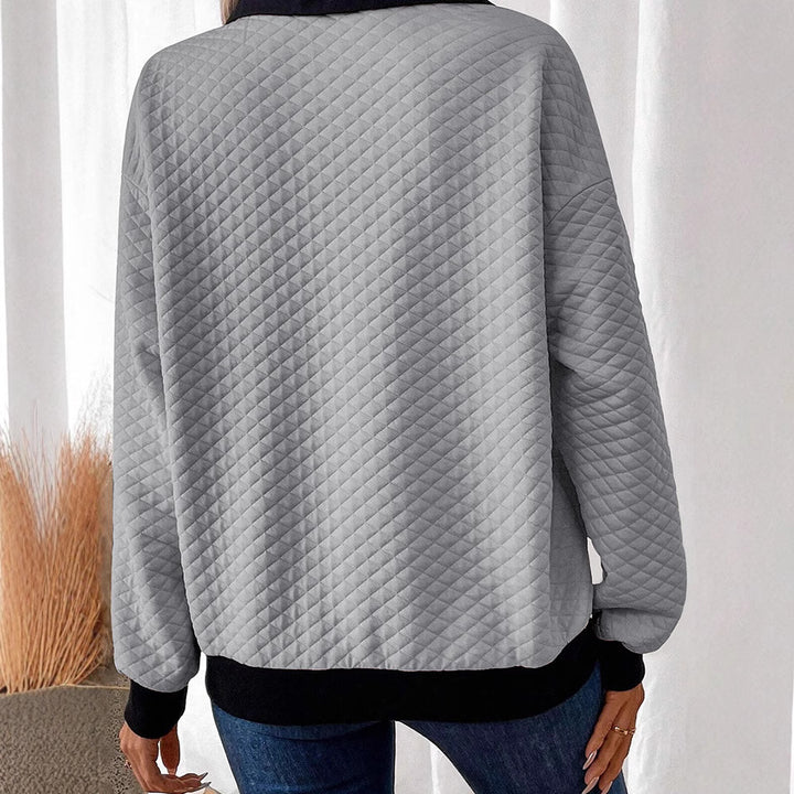 Damen avslappnad sweatshirt med klassisk polo-krage och knappdetaljer Mirla-Eva Jonsson