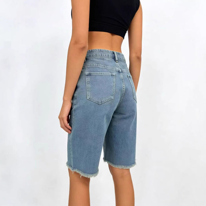Damen avslappnade denimshorts med fransade fållar och hög midja Mirla-Eva Jonsson