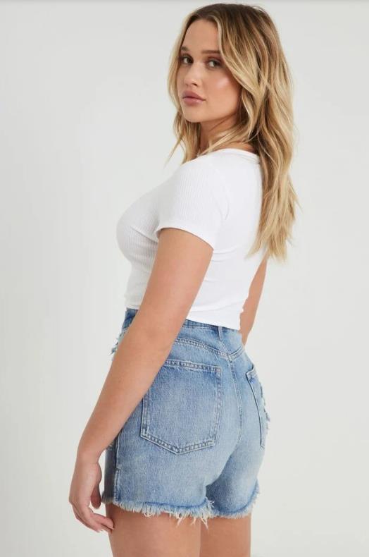 Damen avslappnade denimshorts med hög midja och fransad fåll Mirla-Eva Jonsson