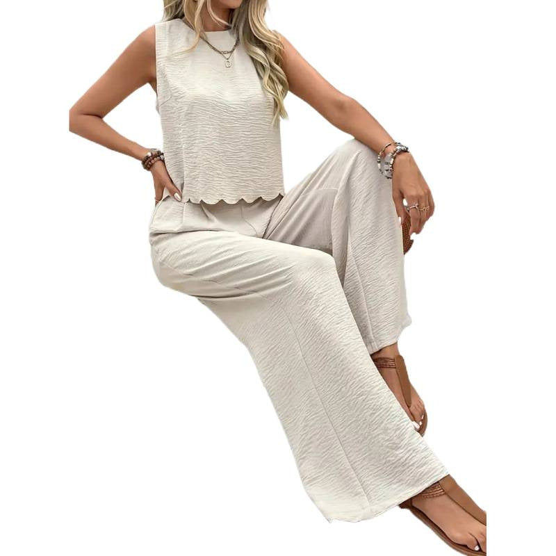 Damen avslappnande tvådelat set med vida byxor och ärmlös topp Mirla-Eva Jonsson