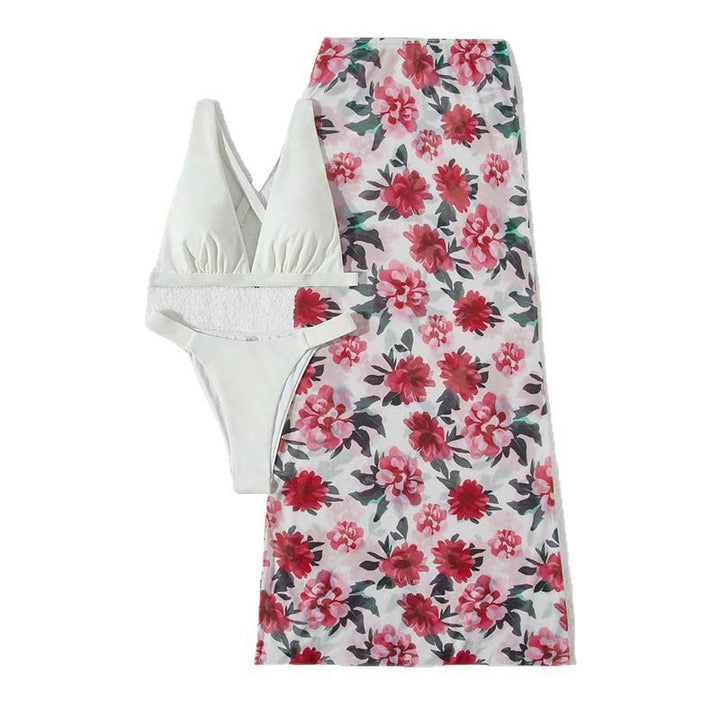 Damen bikini set med elegant omslagkjol och diskret triangelöverdel Mirla-Eva Jonsson
