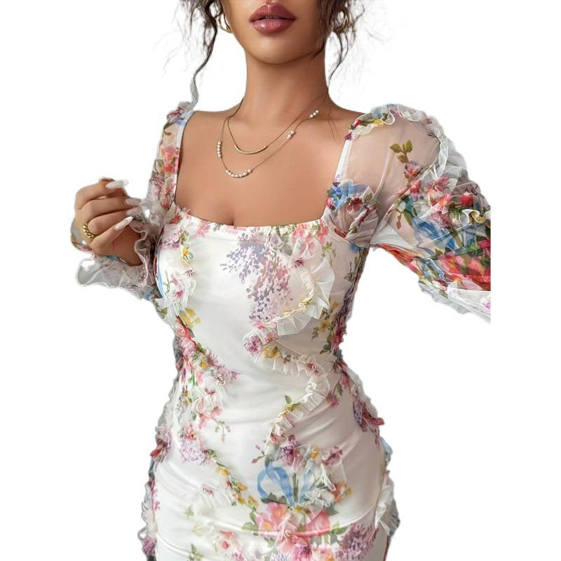 Damen blommklänning med transparenta ärmar Mirla-Eva Jonsson