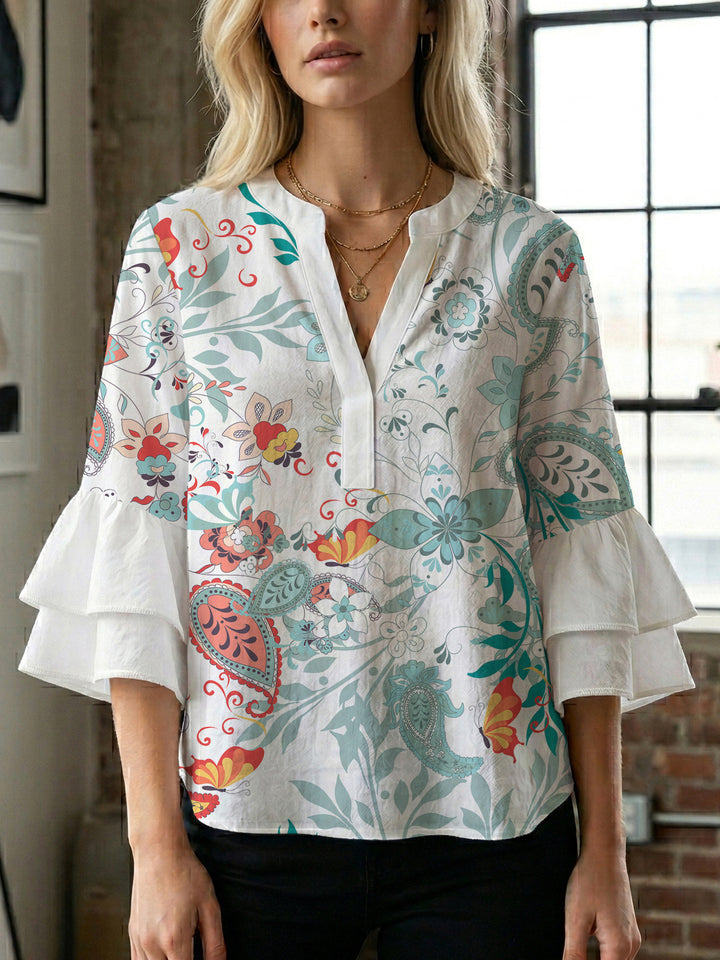 Damen blommkreation med voluminösa ryschärmar Mirla-Eva Jonsson