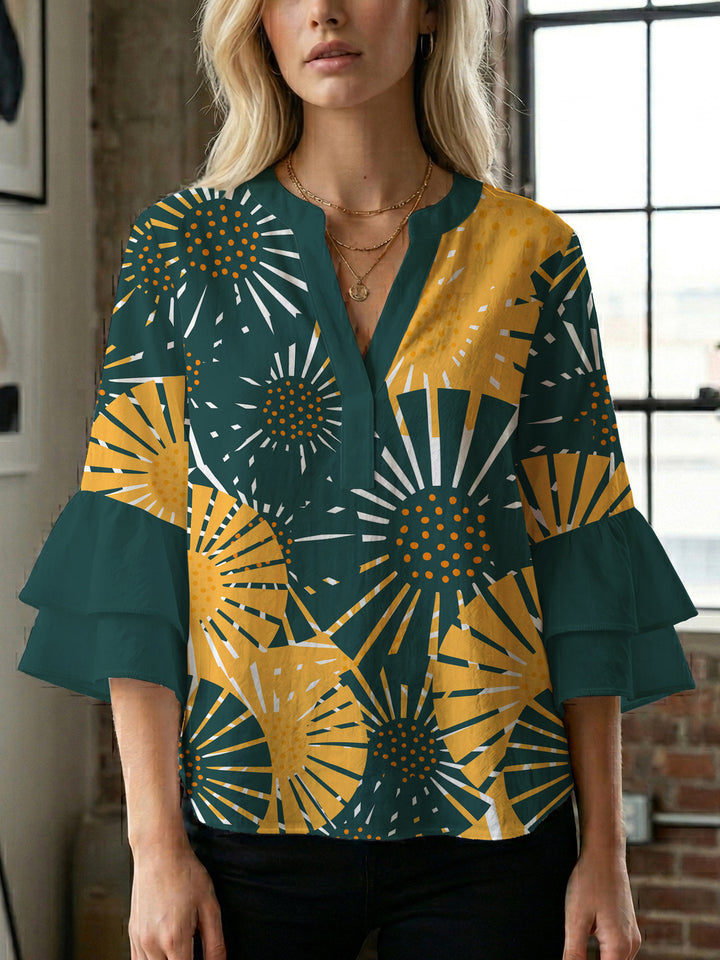 Damen blommkreation med voluminösa ryschärmar Mirla-Eva Jonsson