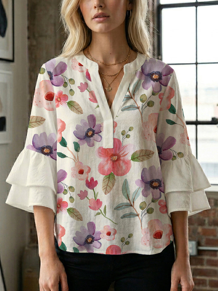 Damen blommkreation med voluminösa ryschärmar Mirla-Eva Jonsson