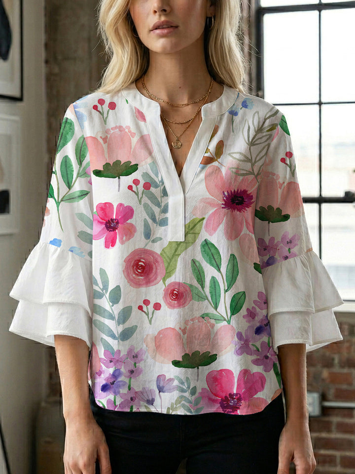 Damen blommkreation med voluminösa ryschärmar Mirla-Eva Jonsson