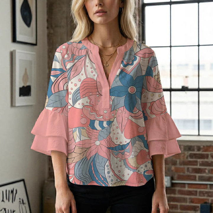 Damen blommkreation med voluminösa ryschärmar Mirla-Eva Jonsson