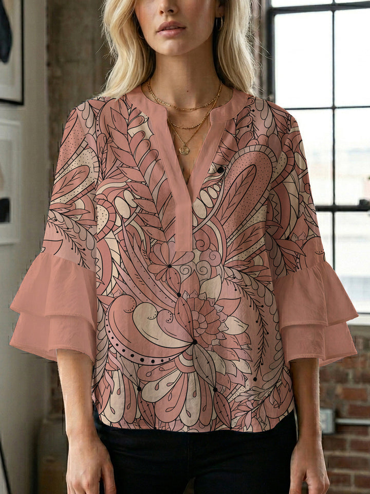 Damen blommkreation med voluminösa ryschärmar Mirla-Eva Jonsson