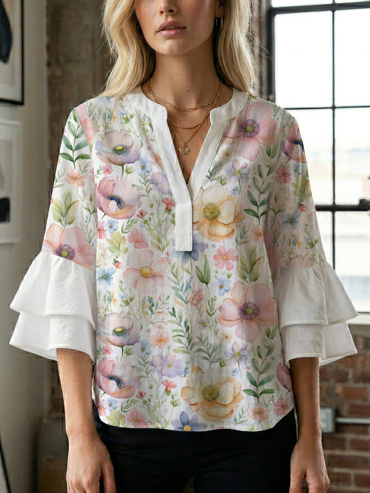 Damen blommkreation med voluminösa ryschärmar Mirla-Eva Jonsson