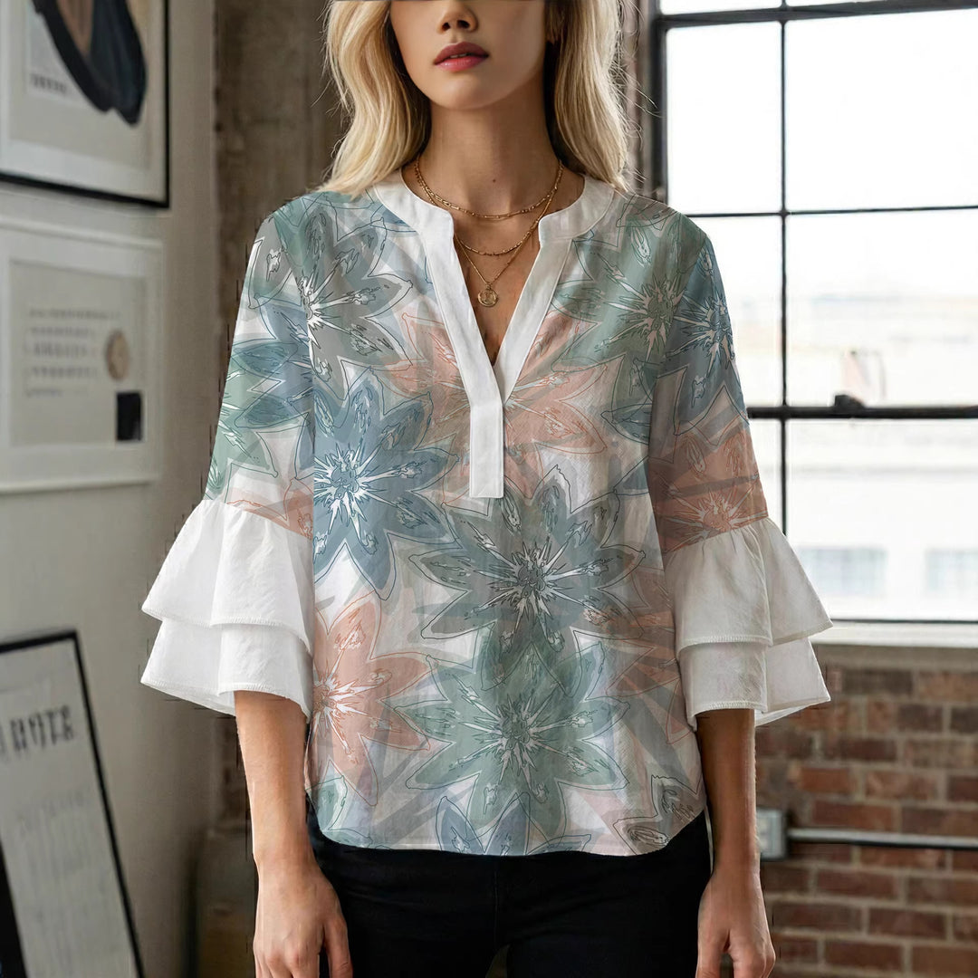 Damen blommkreation med voluminösa ryschärmar Mirla-Eva Jonsson