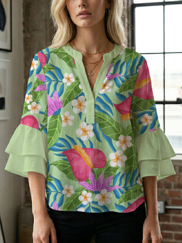 Damen blommkreation med voluminösa ryschärmar Mirla-Eva Jonsson