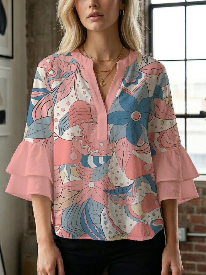 Damen blommkreation med voluminösa ryschärmar Mirla-Eva Jonsson
