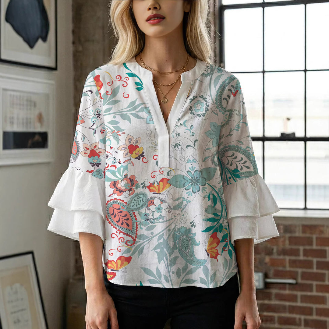 Damen blommkreation med voluminösa ryschärmar Mirla-Eva Jonsson