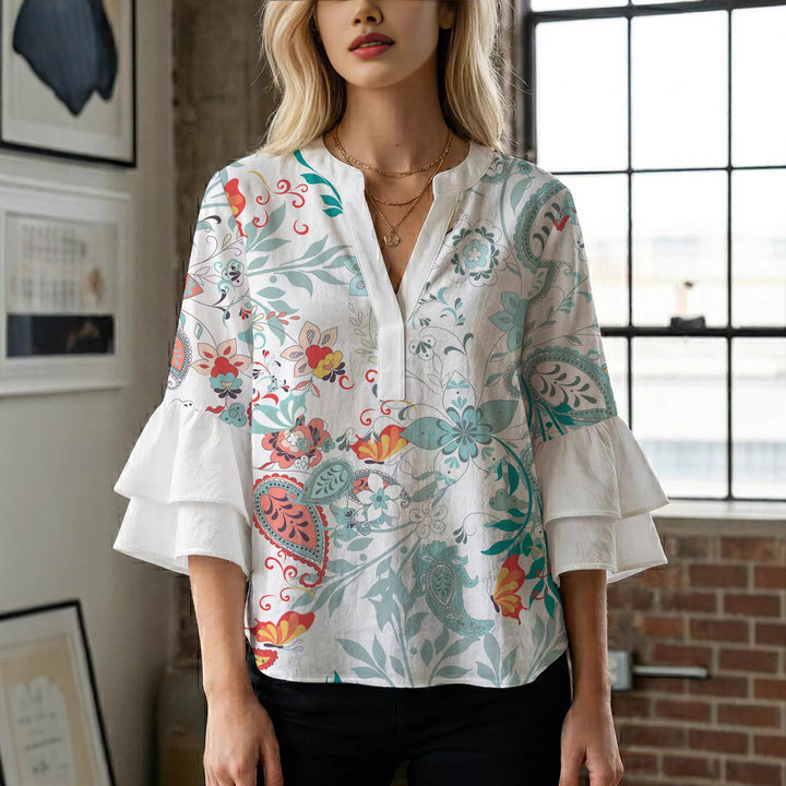 Damen blommkreation med voluminösa ryschärmar Mirla-Eva Jonsson