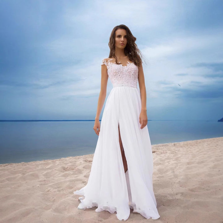 Damen bröllopsklänning med elegant spetsöverdel och svängande kjol Mirla-Eva Jonsson