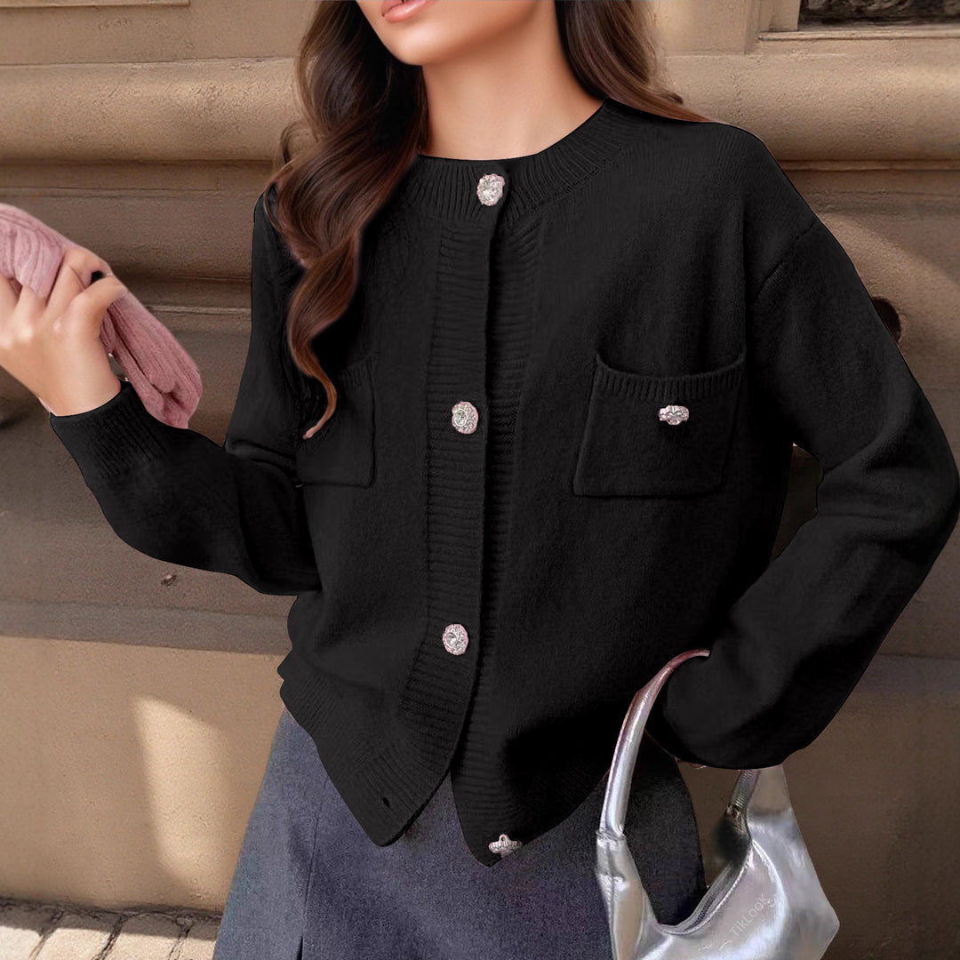 Damen cardigan med eleganta knapppdetaljer och praktiska fickor Mirla-Eva Jonsson