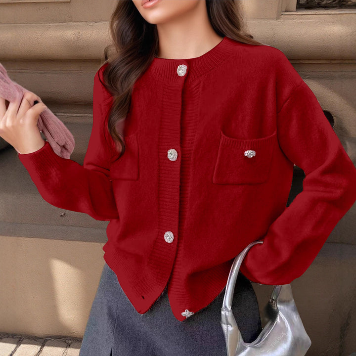 Damen cardigan med eleganta knapppdetaljer och praktiska fickor Mirla-Eva Jonsson