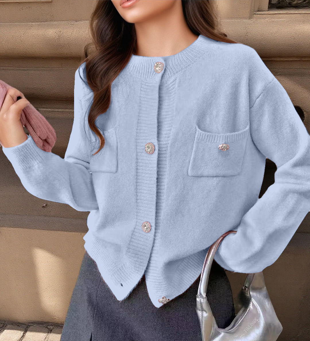 Damen cardigan med eleganta knapppdetaljer och praktiska fickor Mirla-Eva Jonsson
