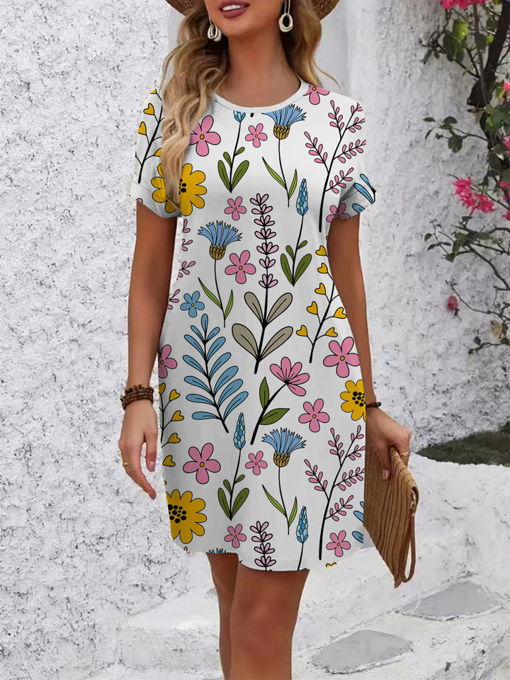 Damen casual T-shirt dress with colorful flower pattern and comfortable fit Mirla-Eva Jonsson