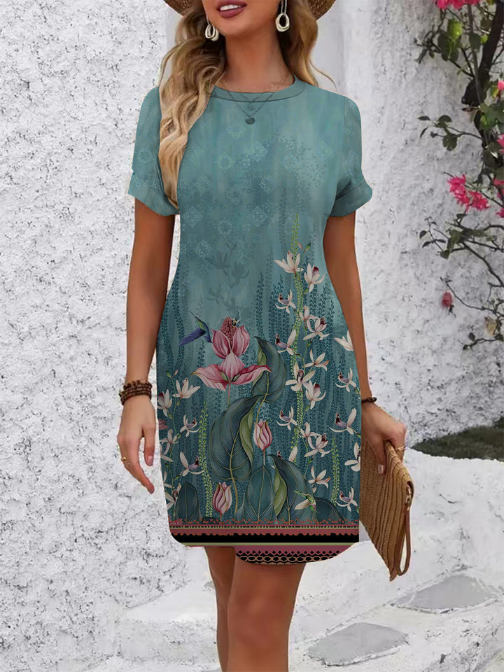 Damen casual kortärmad klänning med blommiga motiv och bekväm passform Mirla-Eva Jonsson