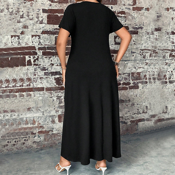 Damen casual maxiklänning med knapppdetaljer och elegant snitt Mirla-Eva Jonsson