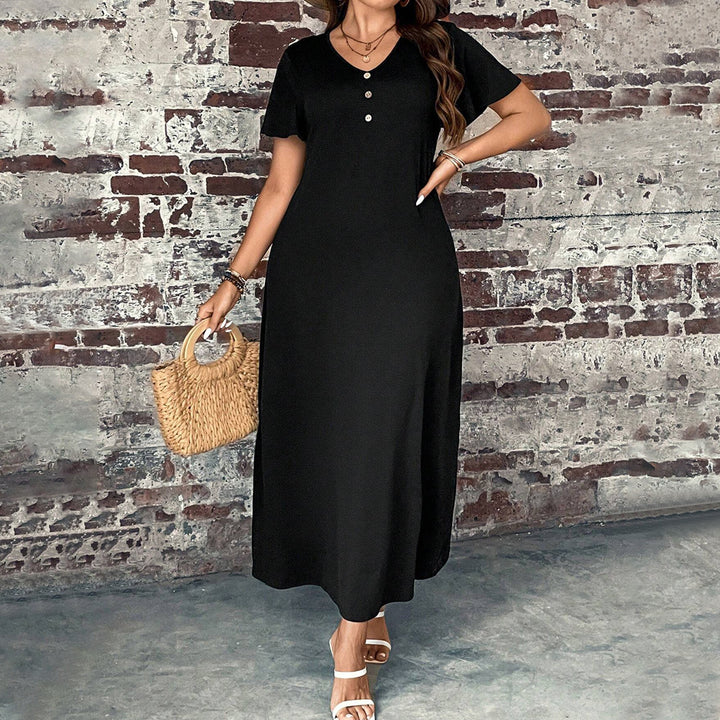 Damen casual maxiklänning med knapppdetaljer och elegant snitt Mirla-Eva Jonsson