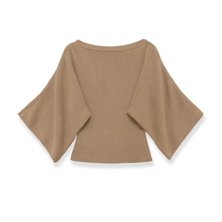 Damen casual top mit innovativem Schnitt und dekorativen Knöpfen Mirla-Eva Jonsson