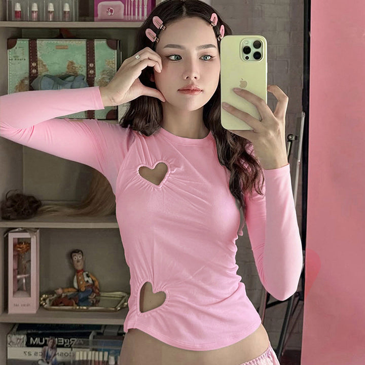 Damen crop top med hjärtformade utskärningar och modernt draperingselement Mirla-Eva Jonsson