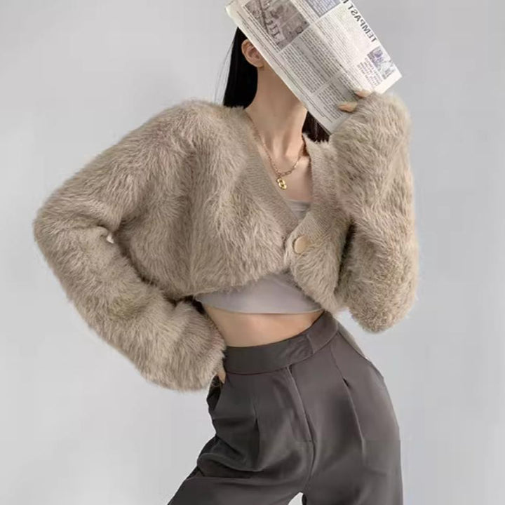 Damen cropped Strickjacke mit voluminösen Ärmeln und Knopfdetail Mirla-Eva Jonsson